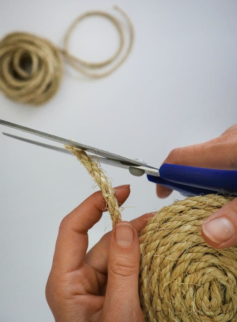cutting rope with scissors