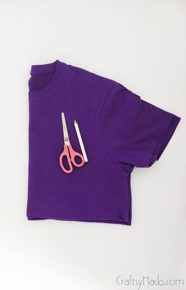 folded shirt with supplies
