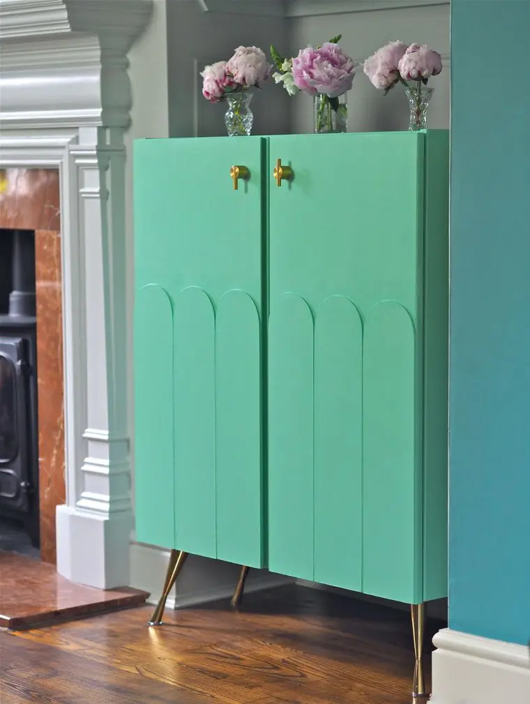 teal art deco cabinet