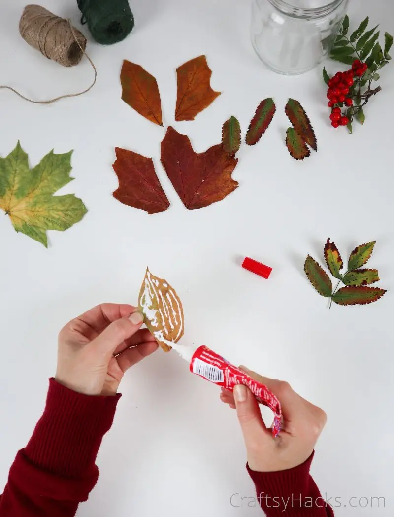 adding glue to leaves