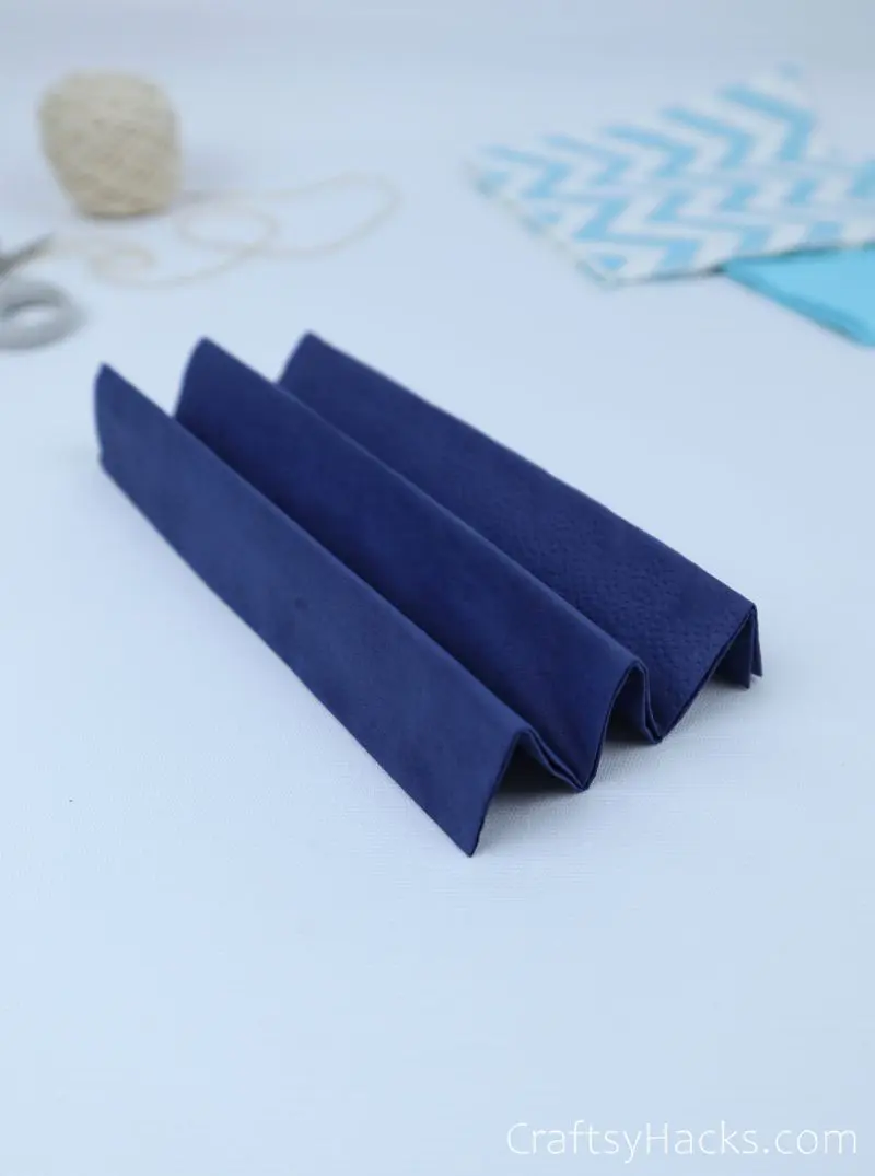 fan-folded blue tissue paper