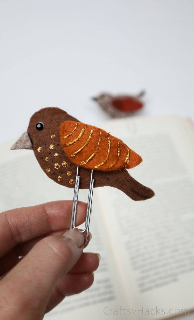holding bird bookmark