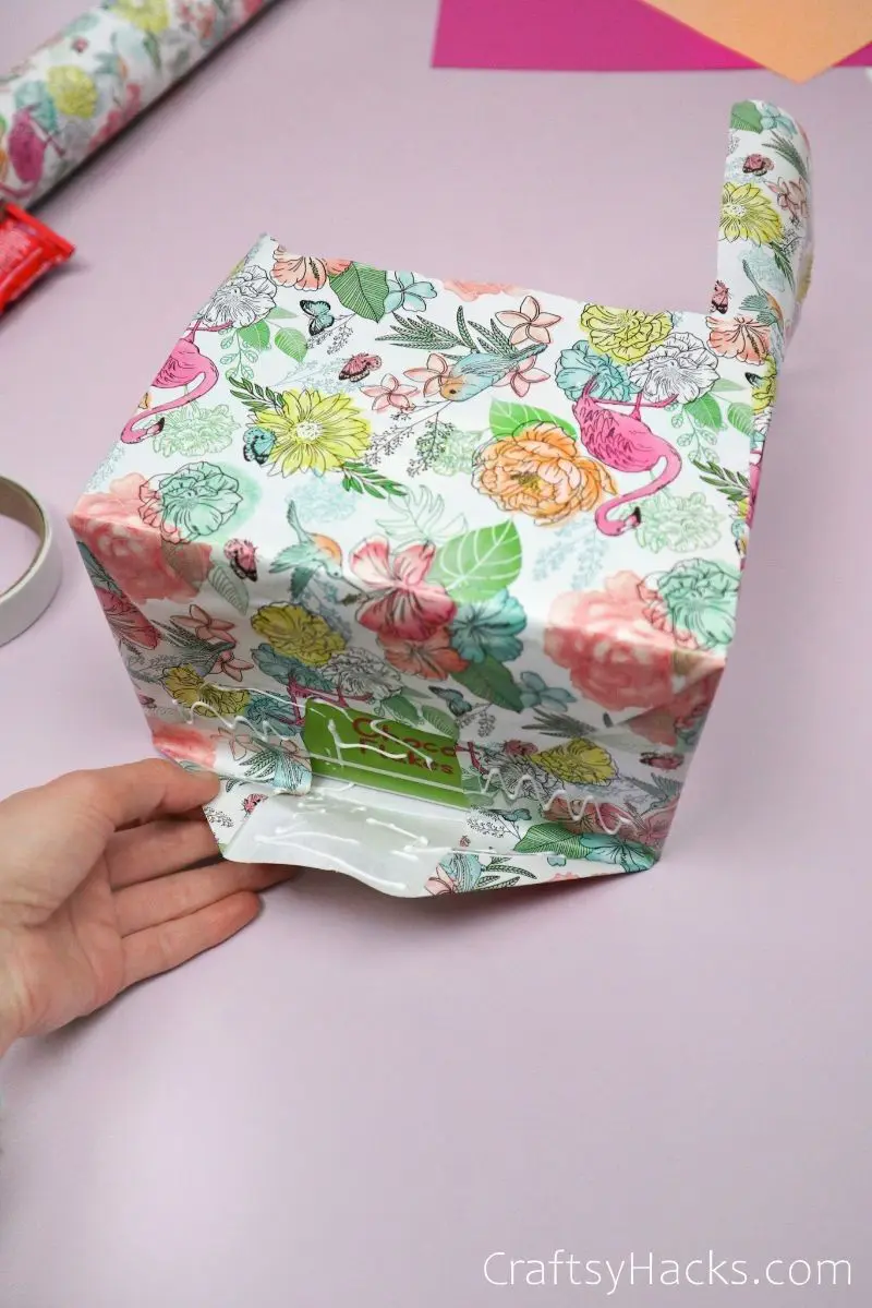 glueing down wrapping paper