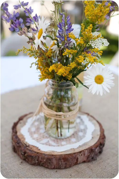 Mason Jar with purple and yellow flowers