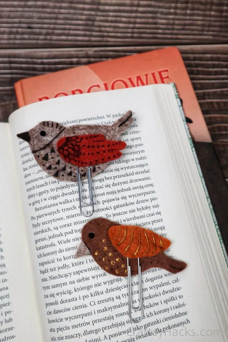 two handmade bookmarks in open book