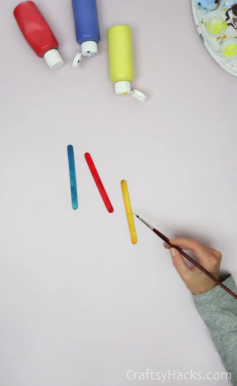 painting popsicle sticks