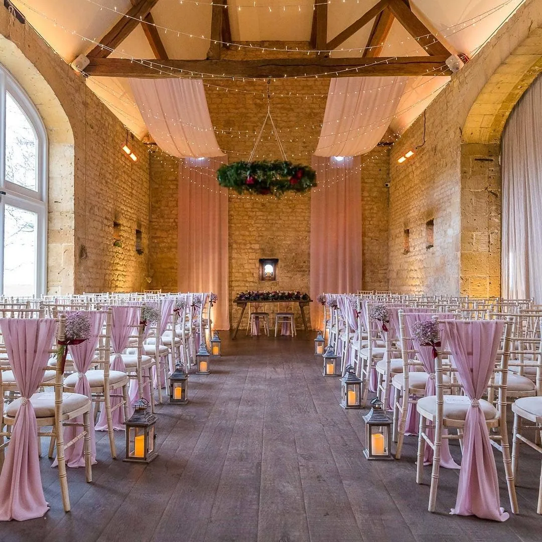 pink chair decor and lanterns