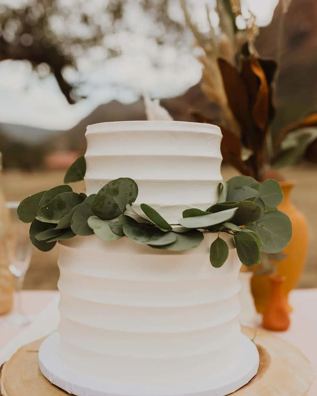 elegant cake with green leaves