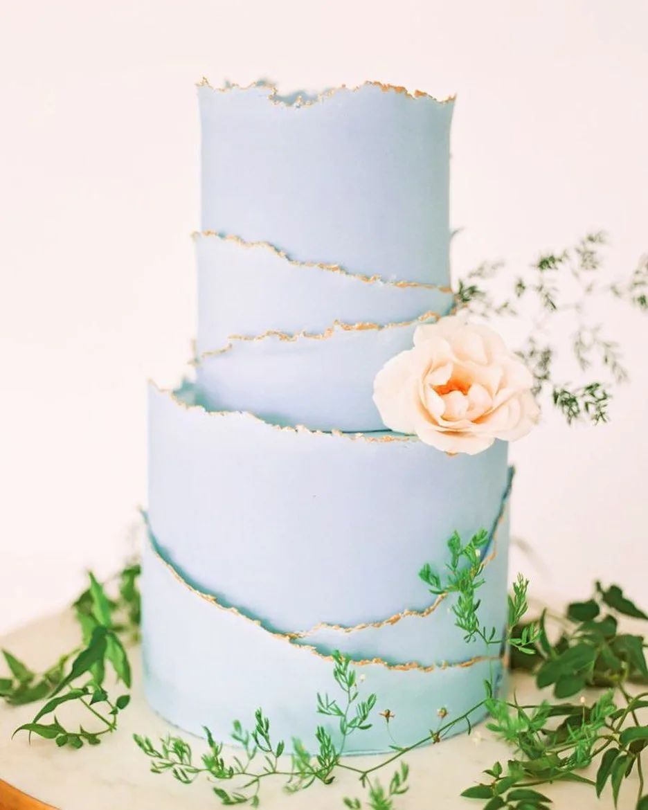 blue and gold trimmed cake