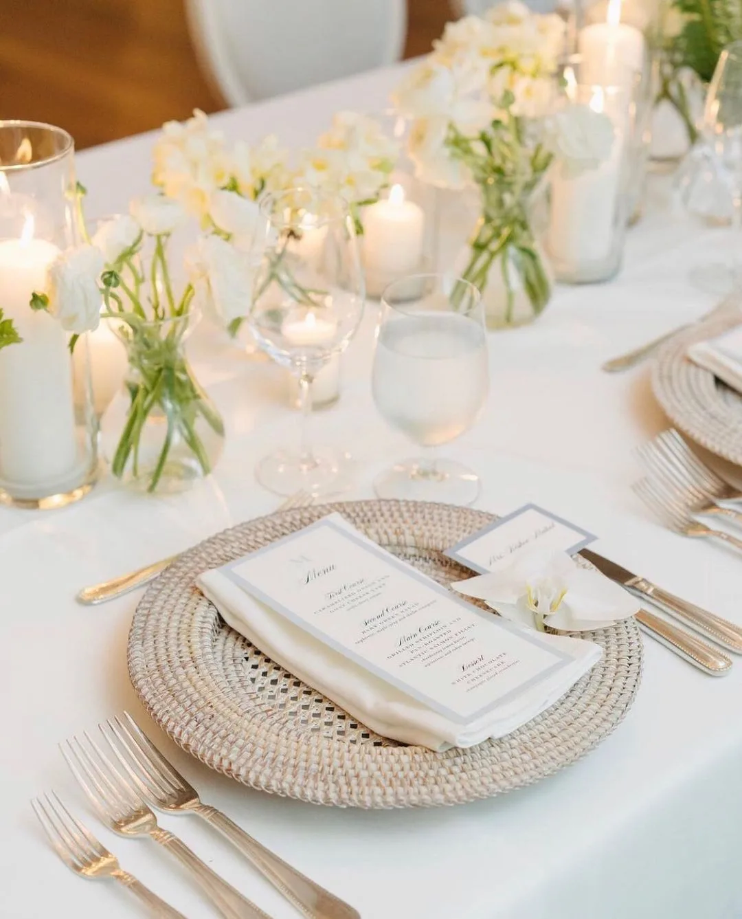 White Roses, White Candles, And Whicker Plates