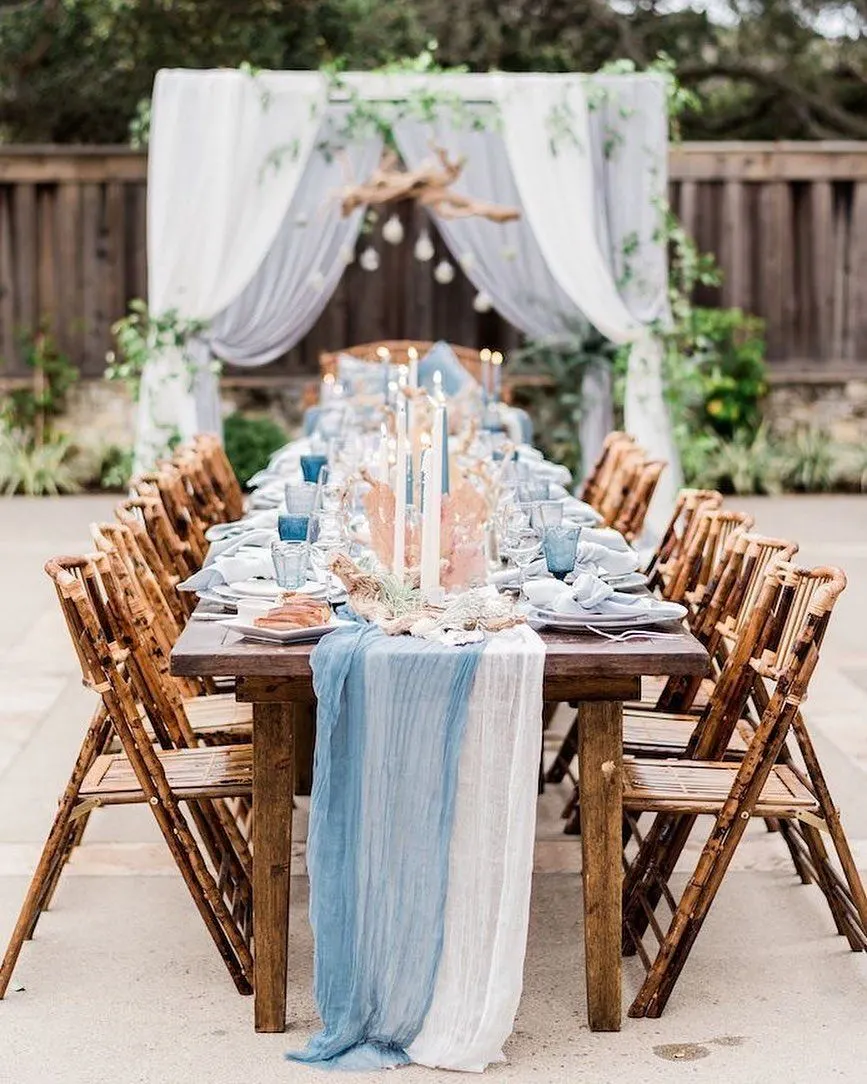 white and blue decor with wood table