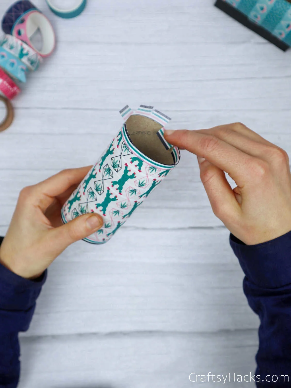 tucking washi tape inside paper roll