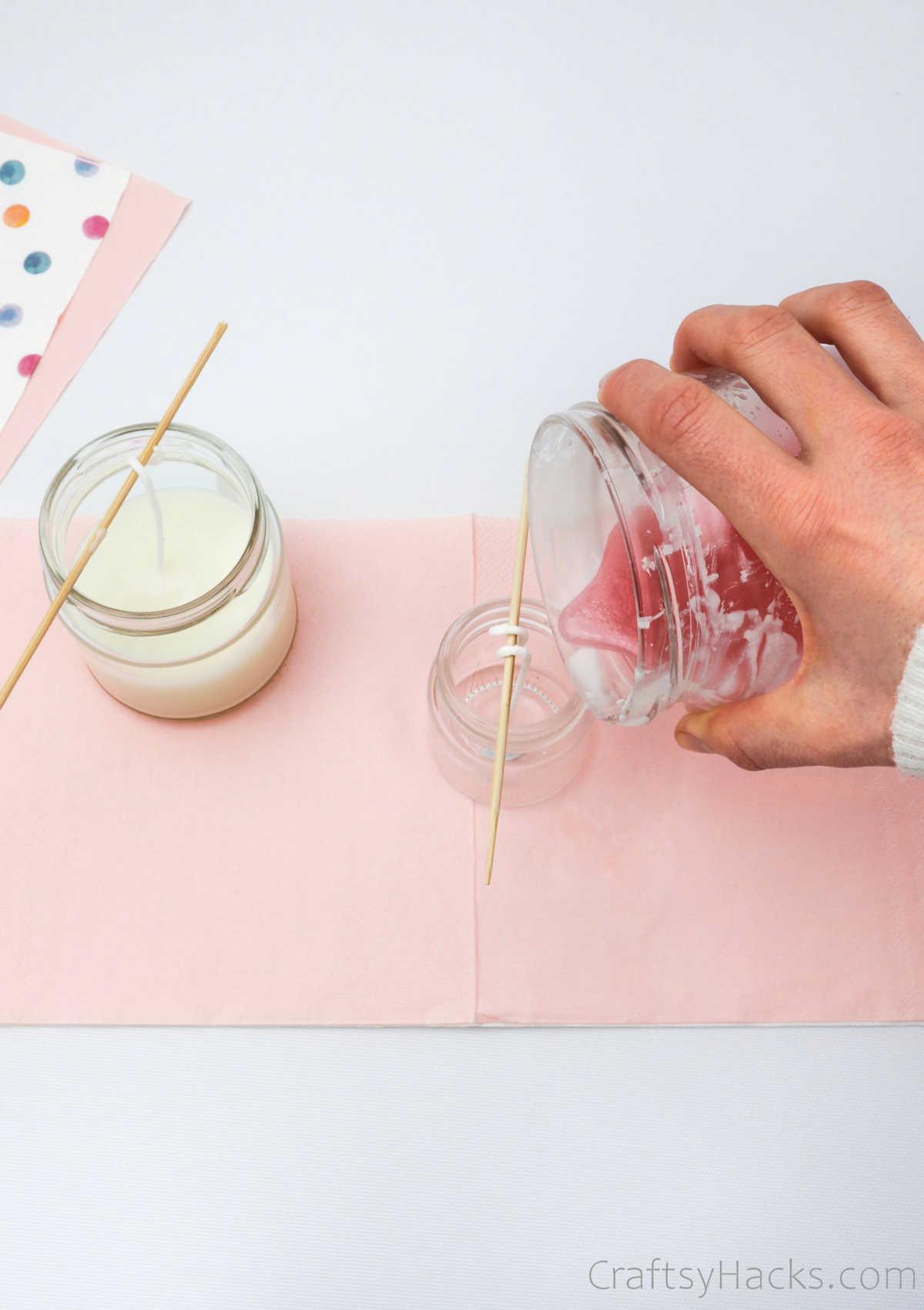 pouring wax into jar