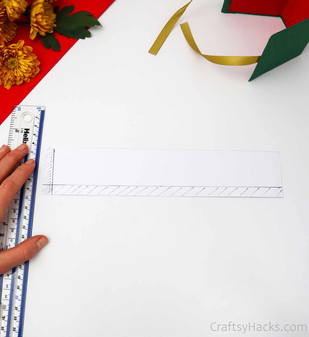 measuring paper with ruler