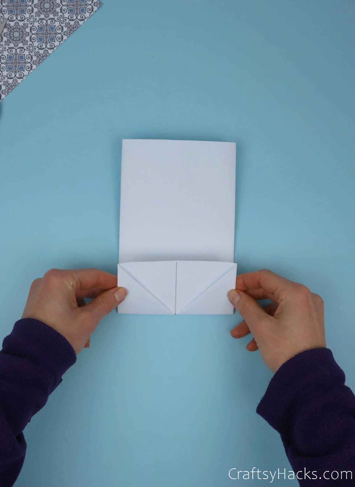 folding up bottom of paper