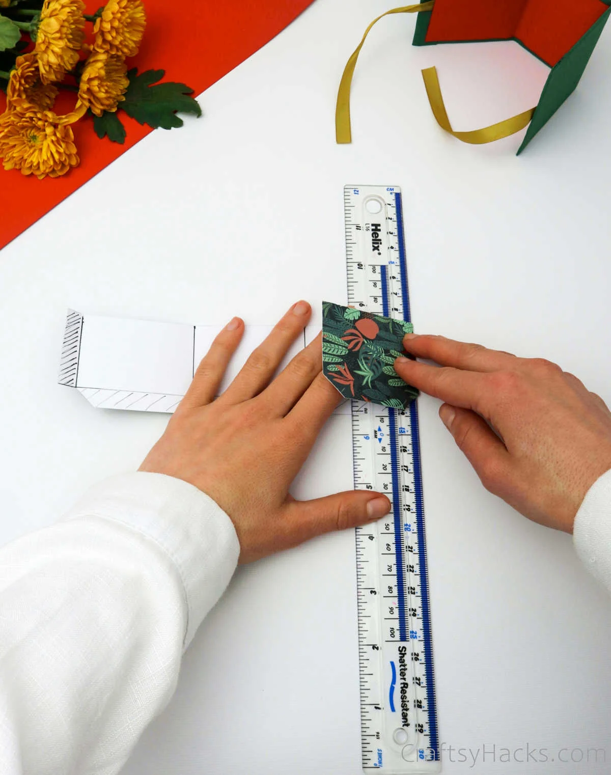 folding paper over ruler