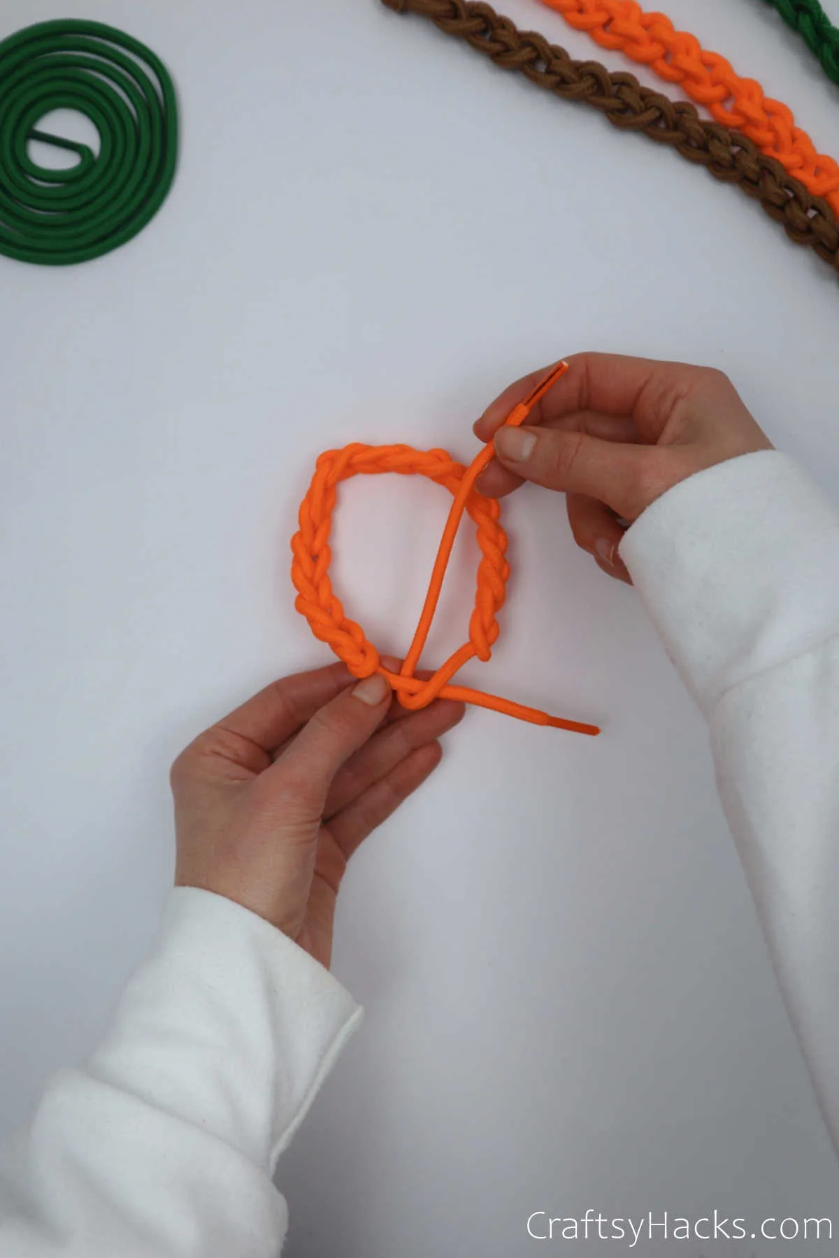 tying bracelet together