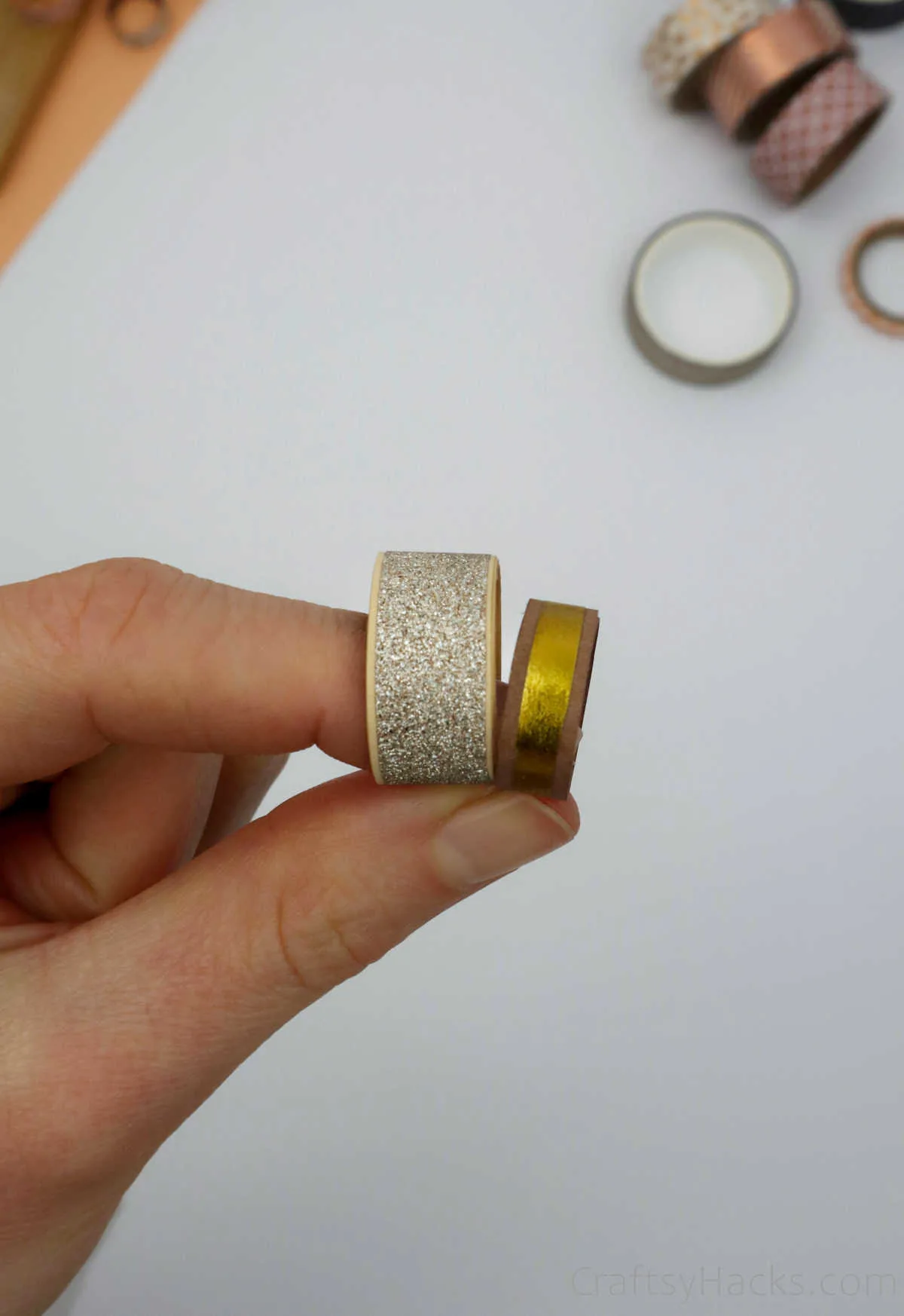 holding two paper DIY rings