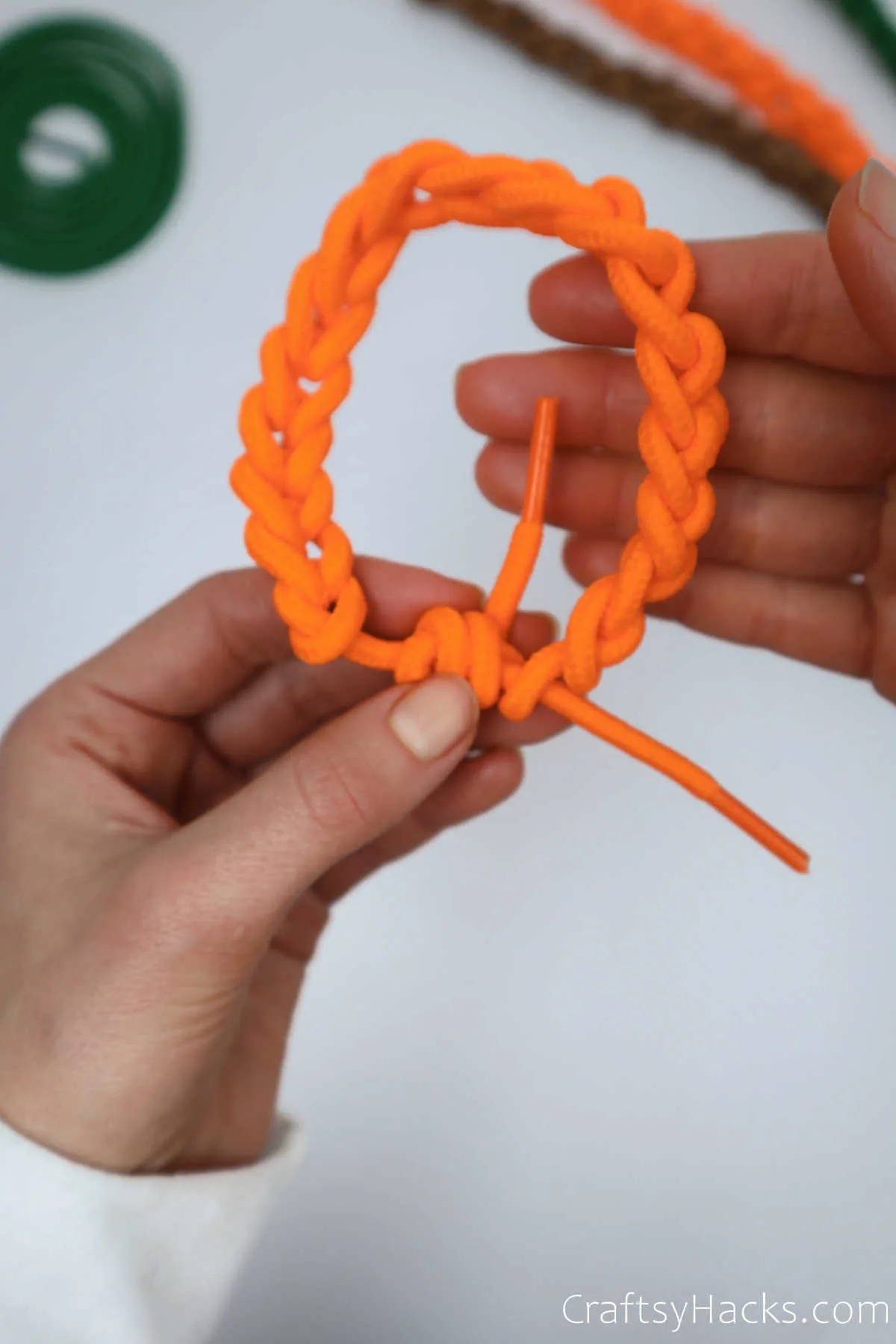 closeup completed orange bracelet