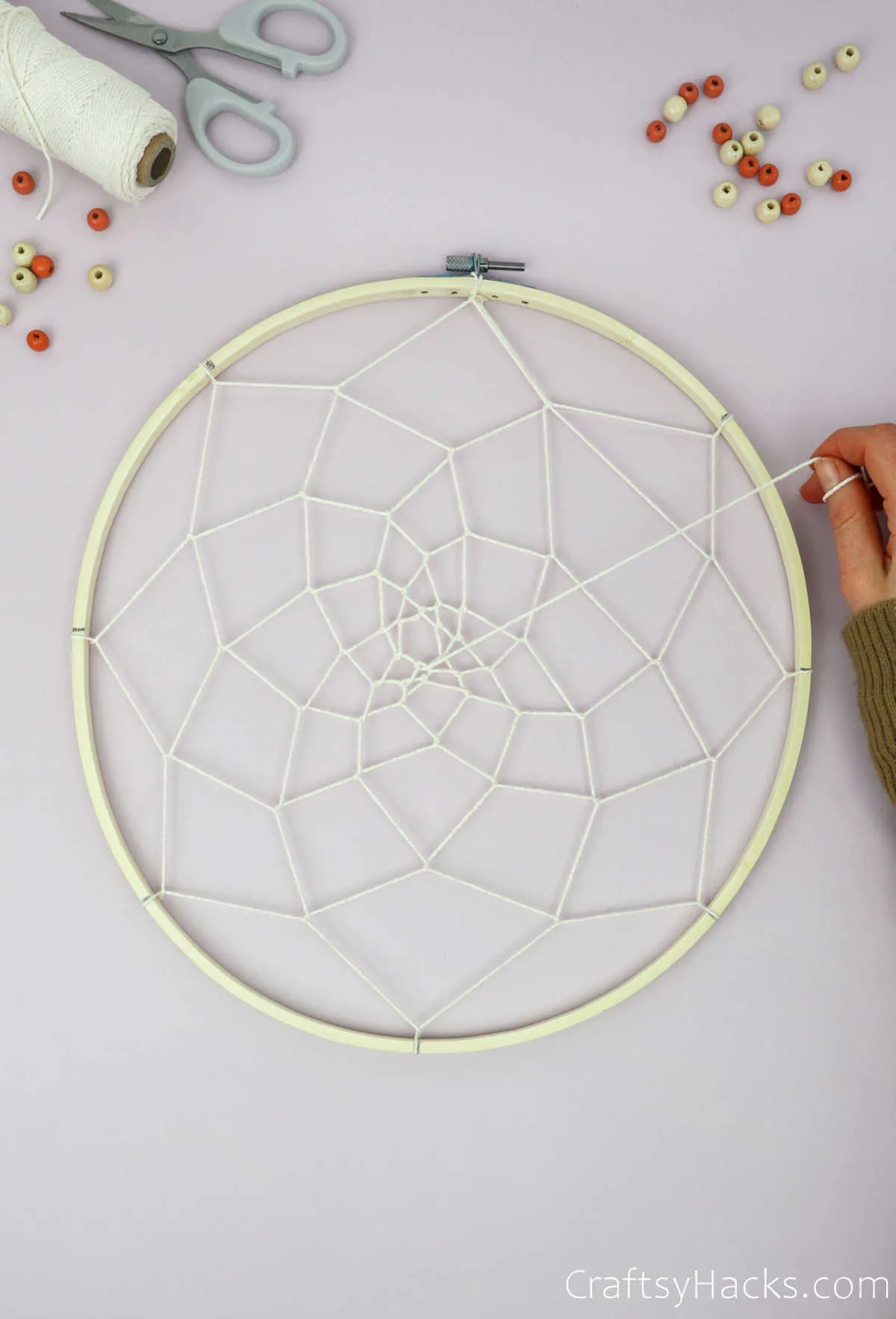 attaching string in middle of hoop