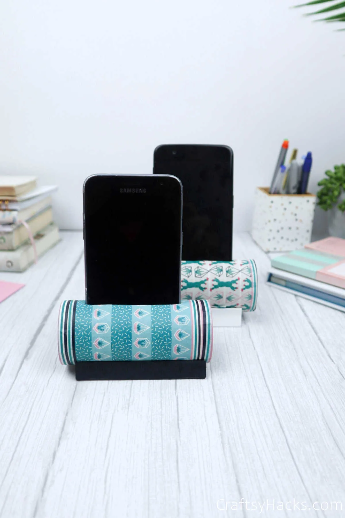 paper roll phone holders with phones