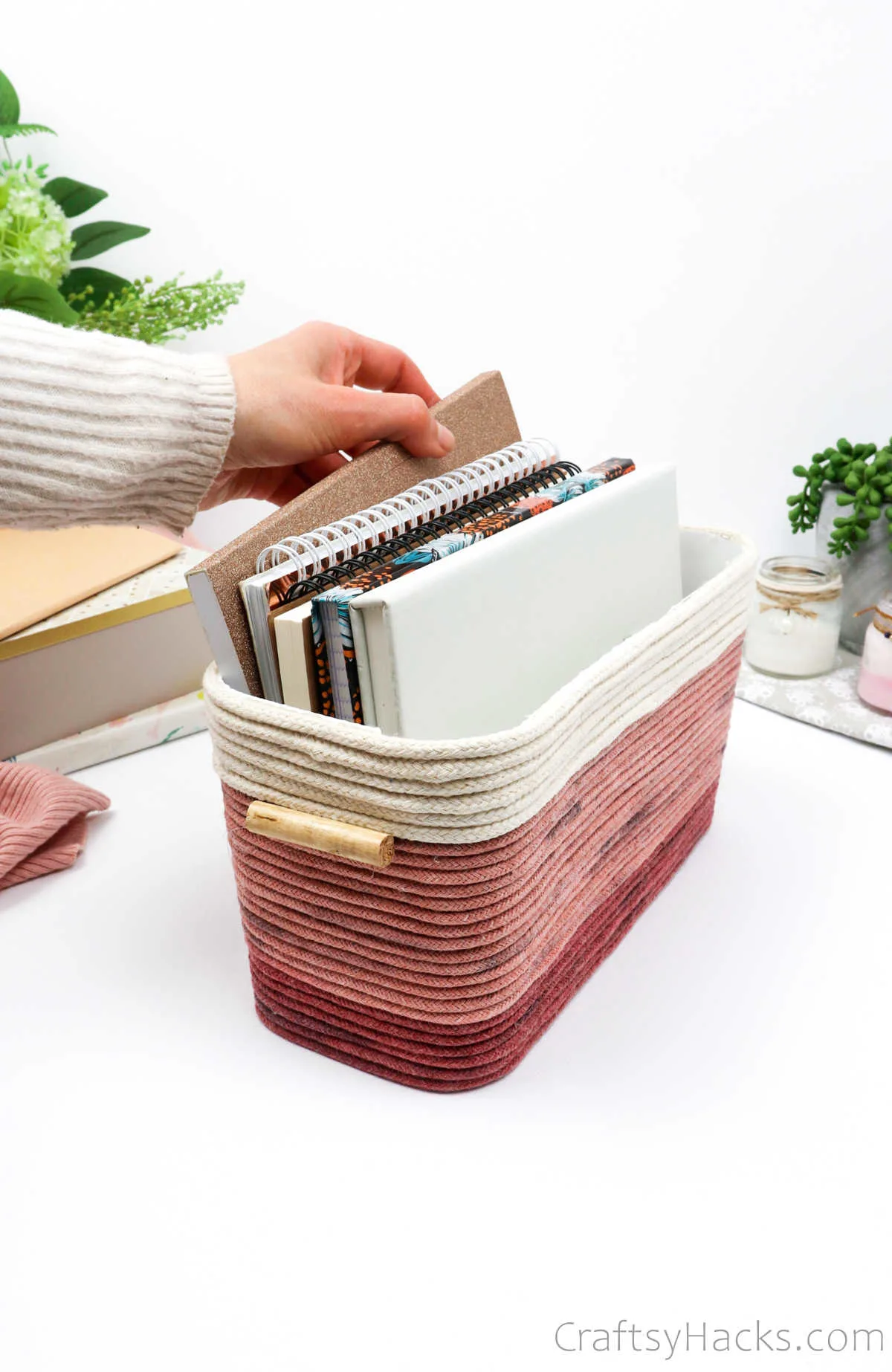 notebooks in rope basket