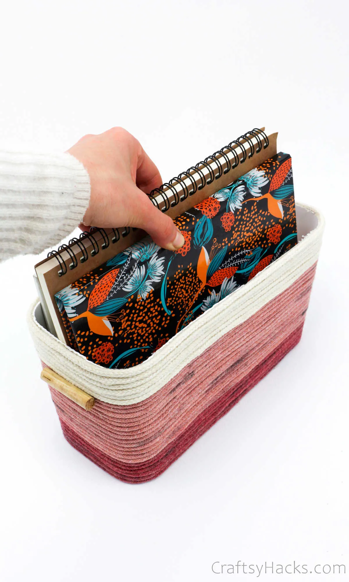 notebooks in rope basket