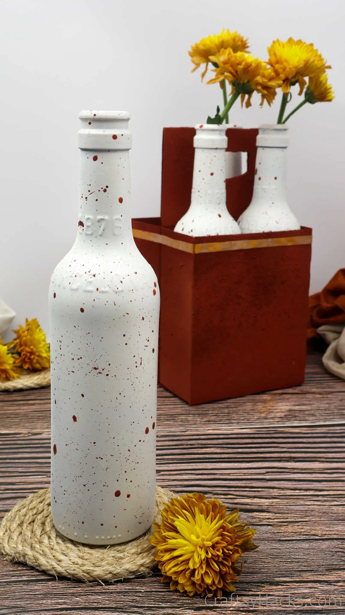 bottle with paint splatter