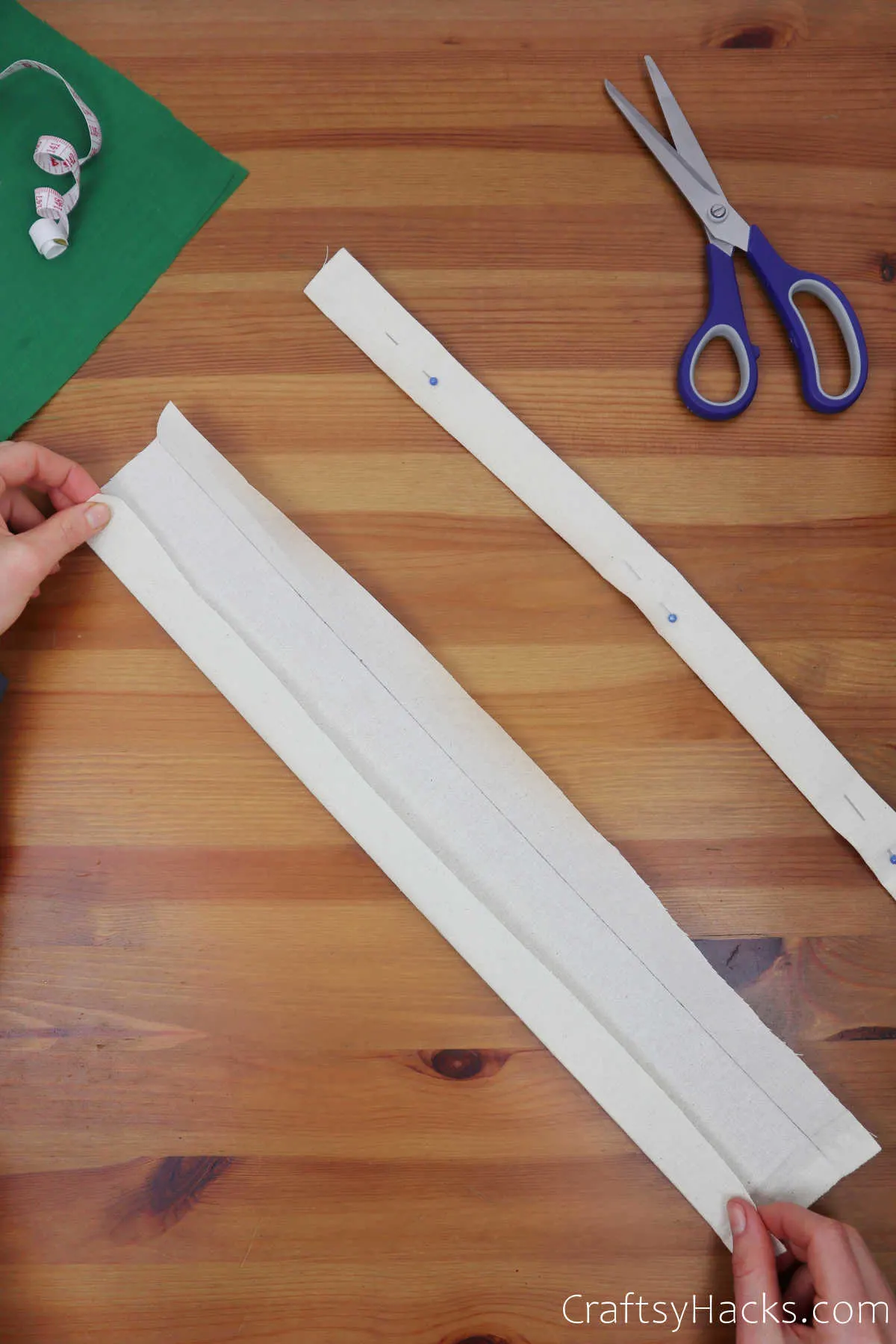 folding strip of fabric