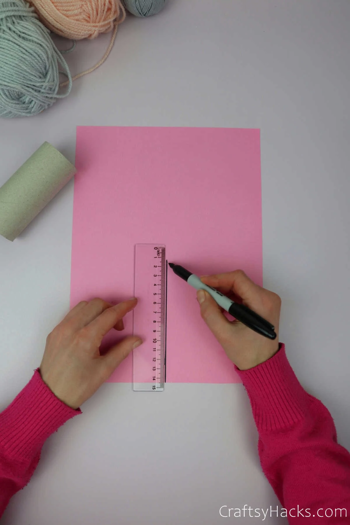measuring on paper with ruler