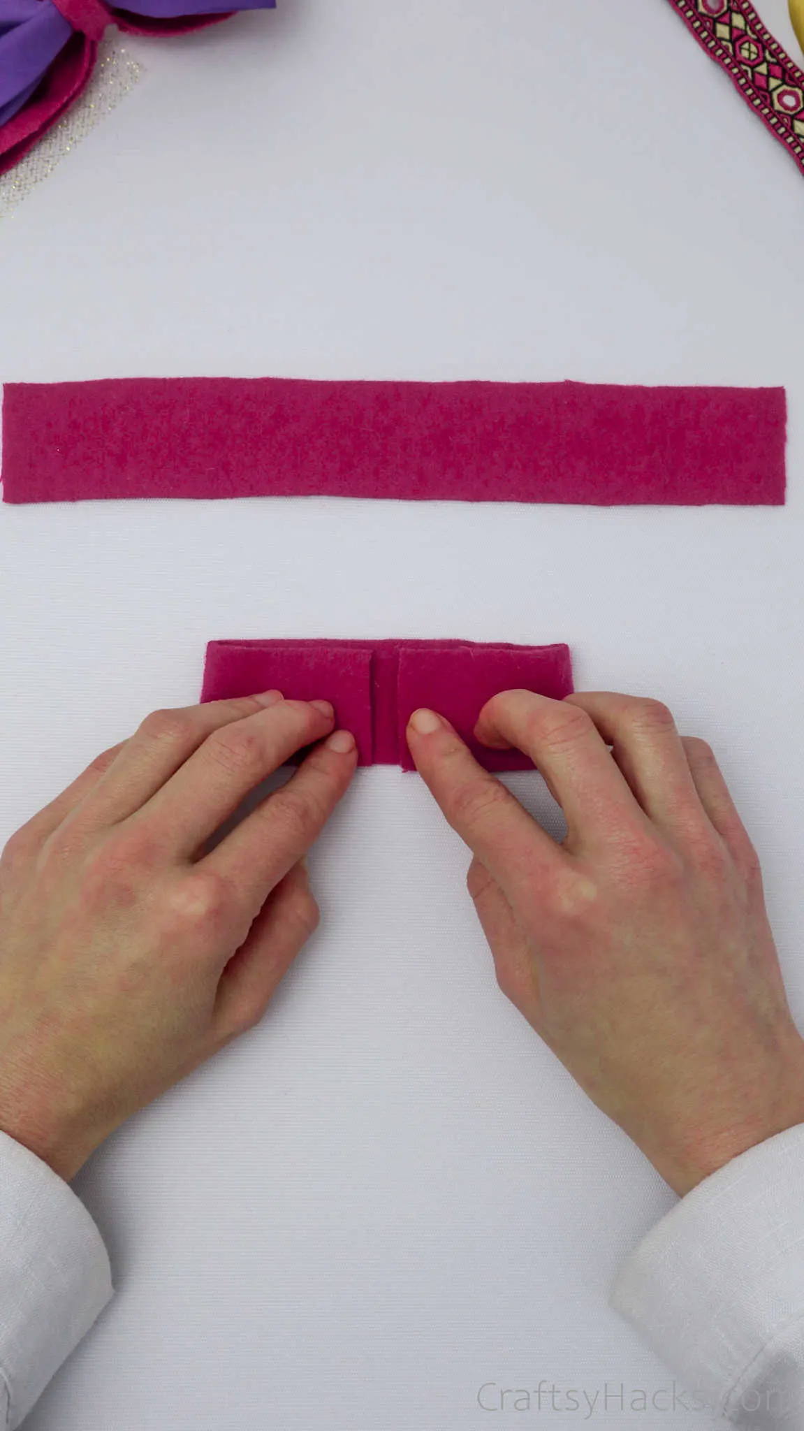 glueing down pink felt