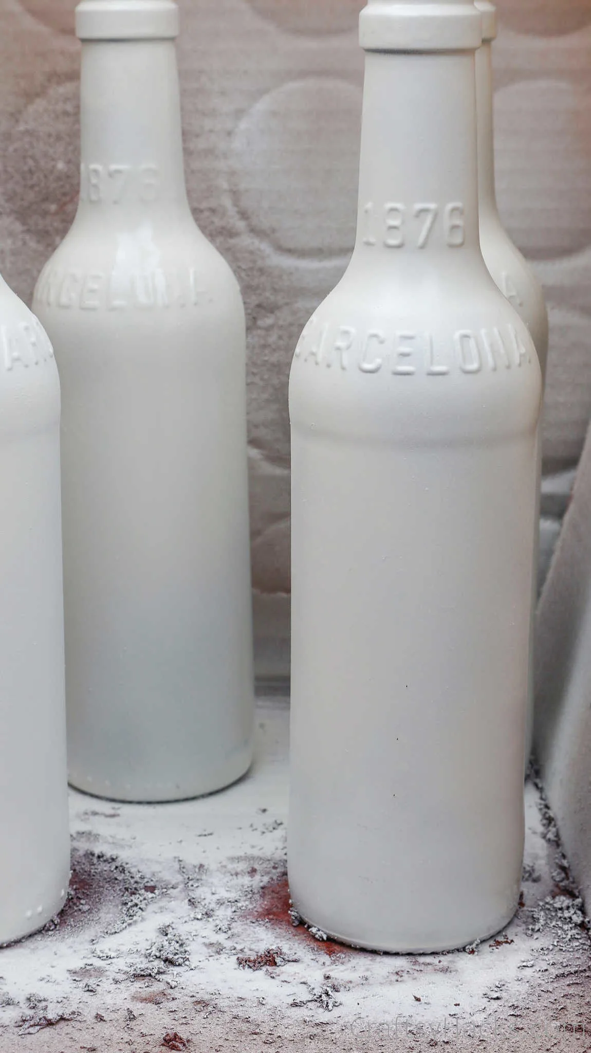 beer bottles painted white