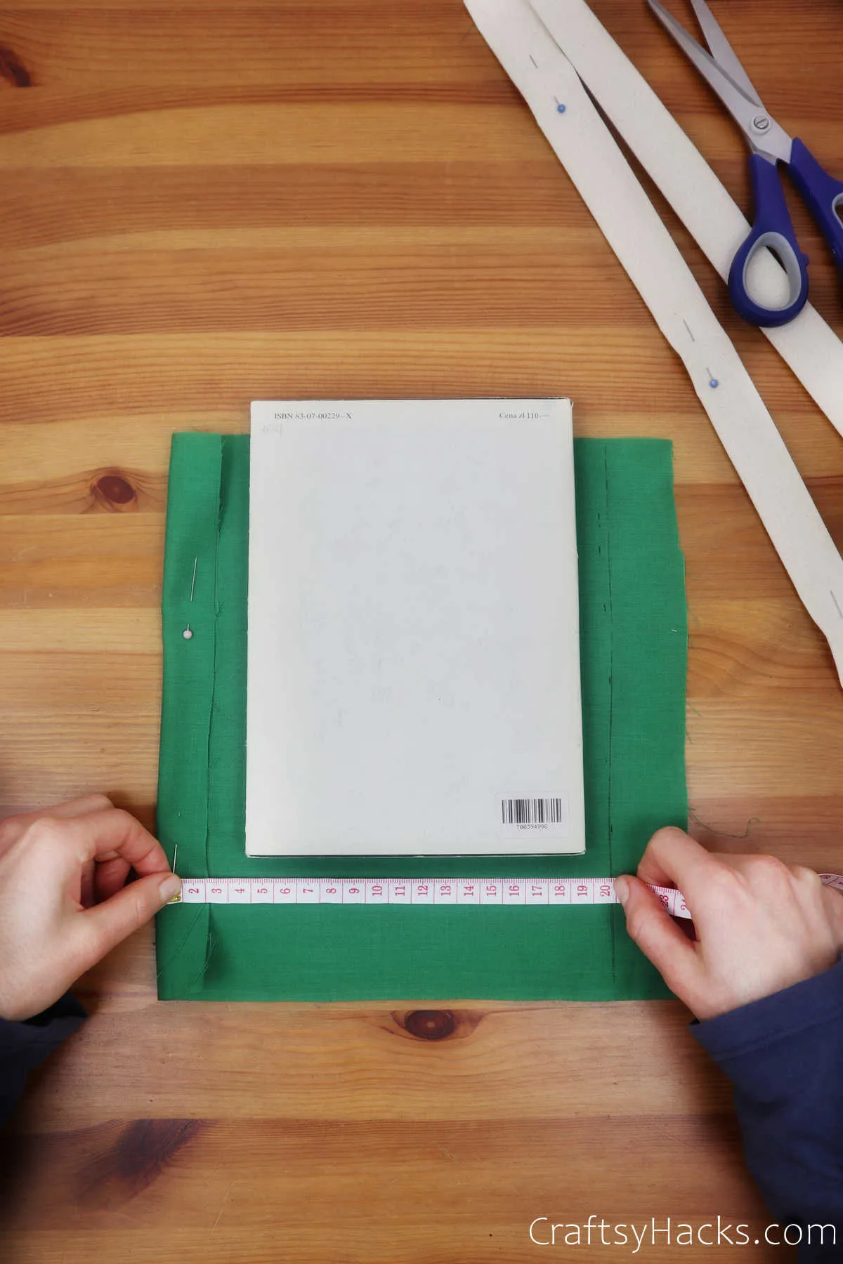 measuring green fabric