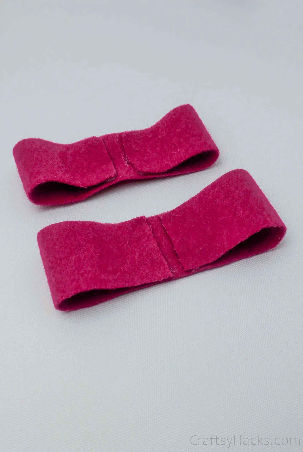 two pink felt pieces