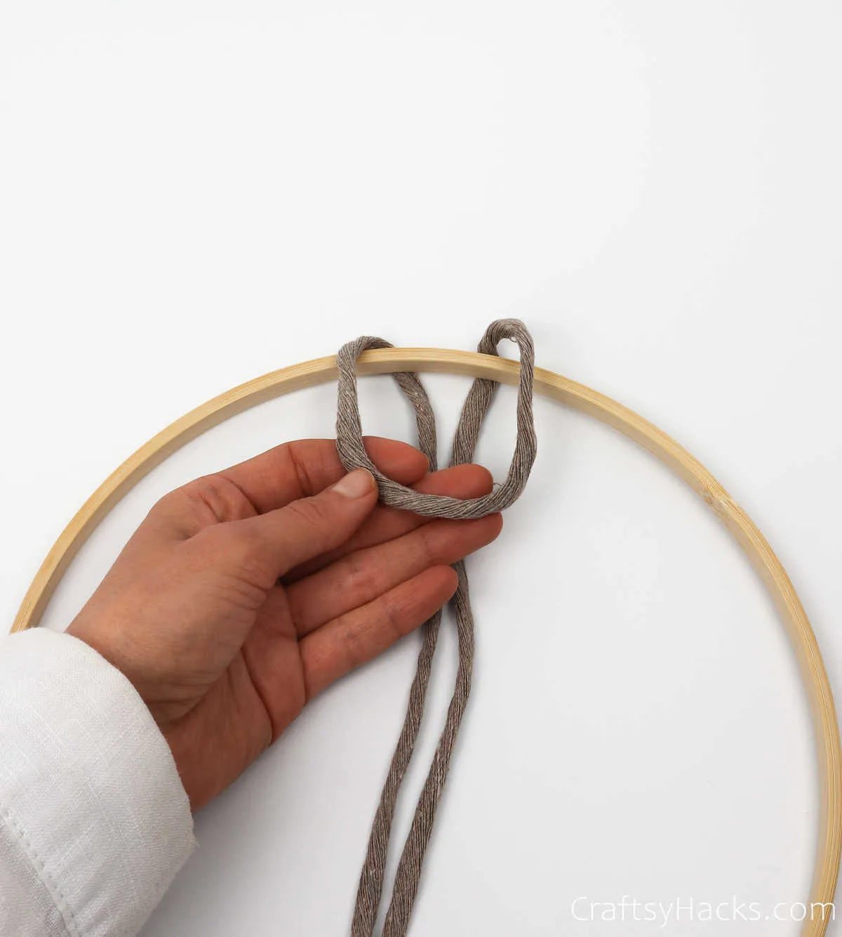 looping yarn on hoop