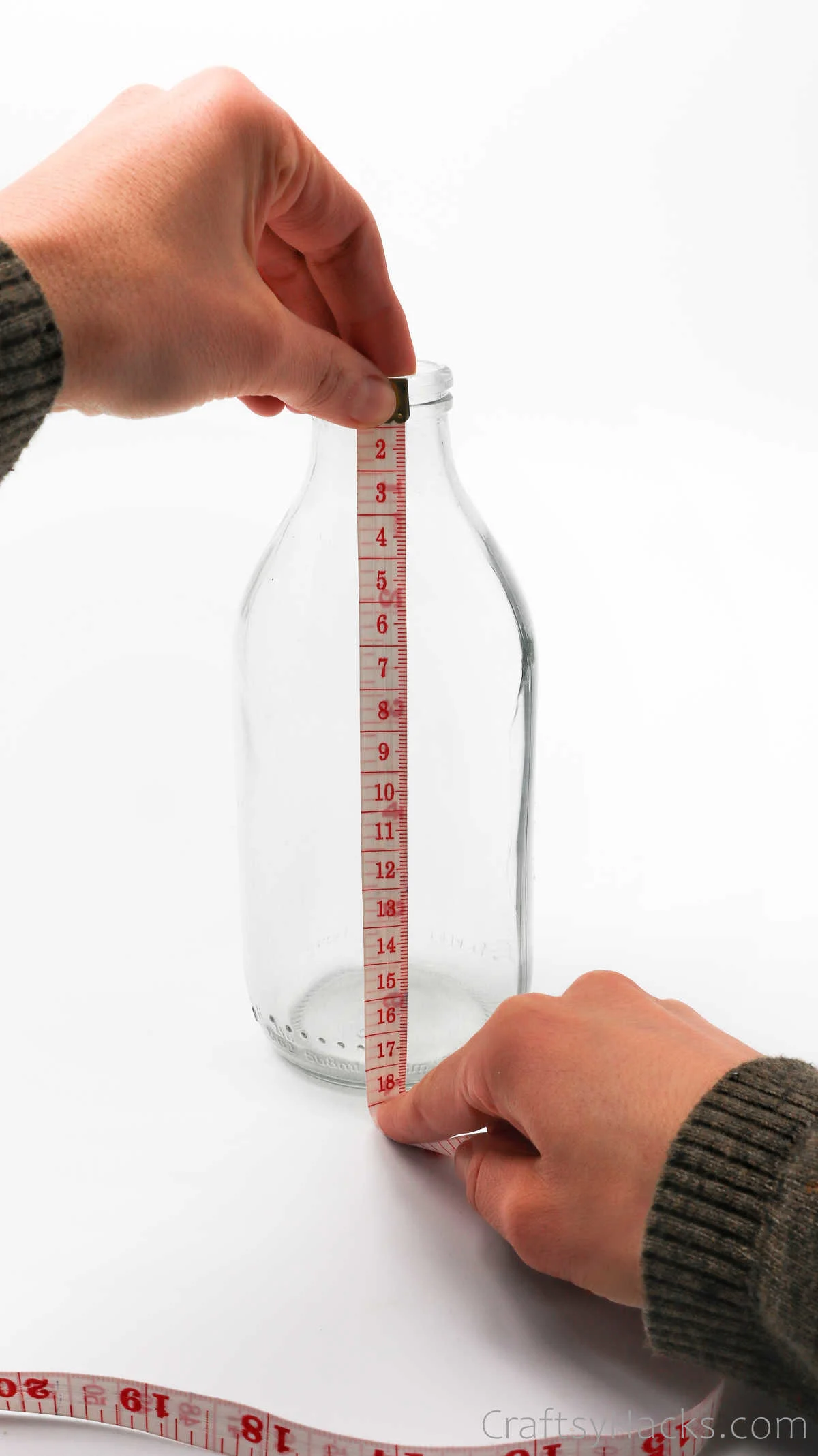 measuring height of bottle