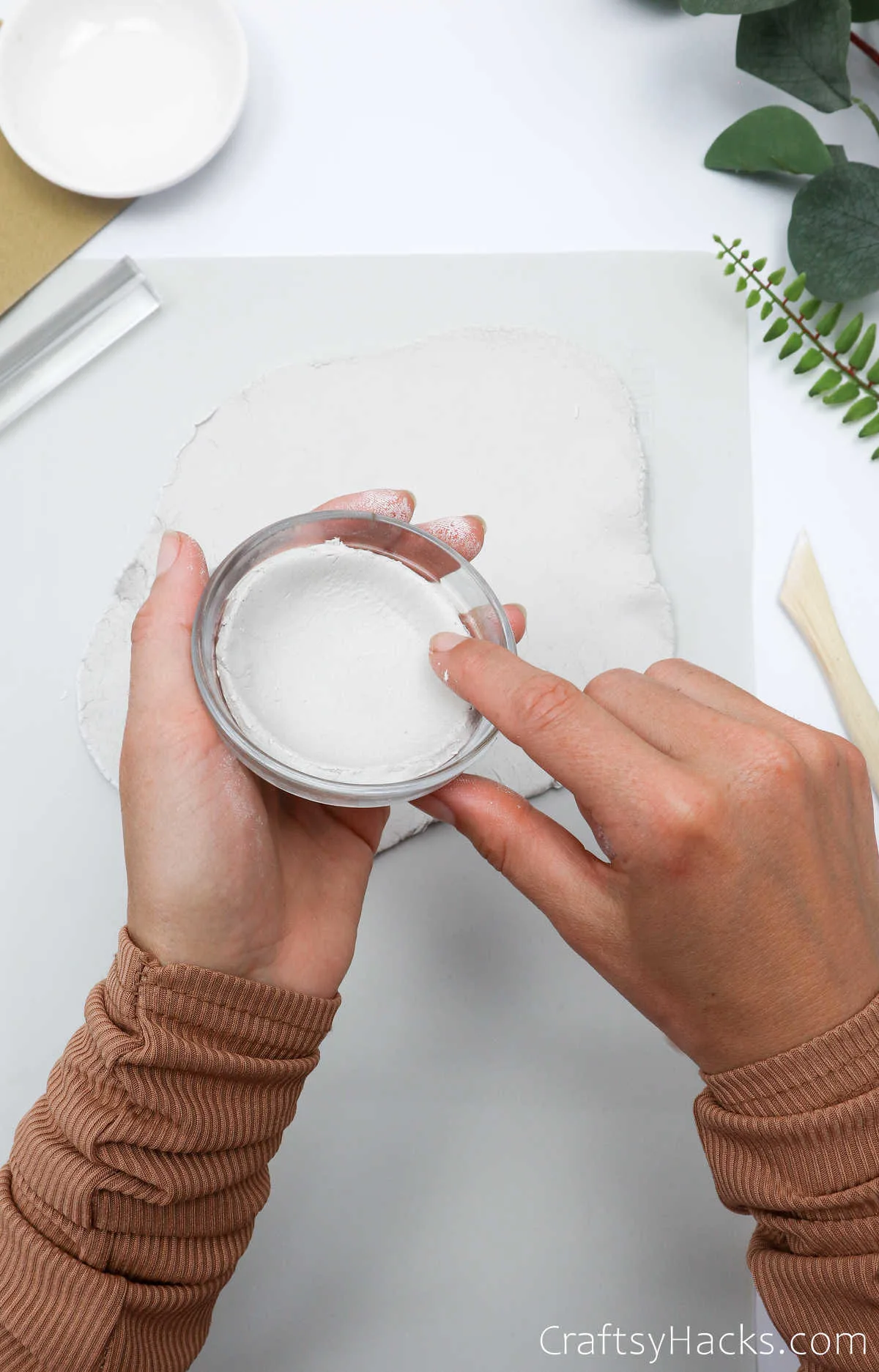 moulding bowl with clay