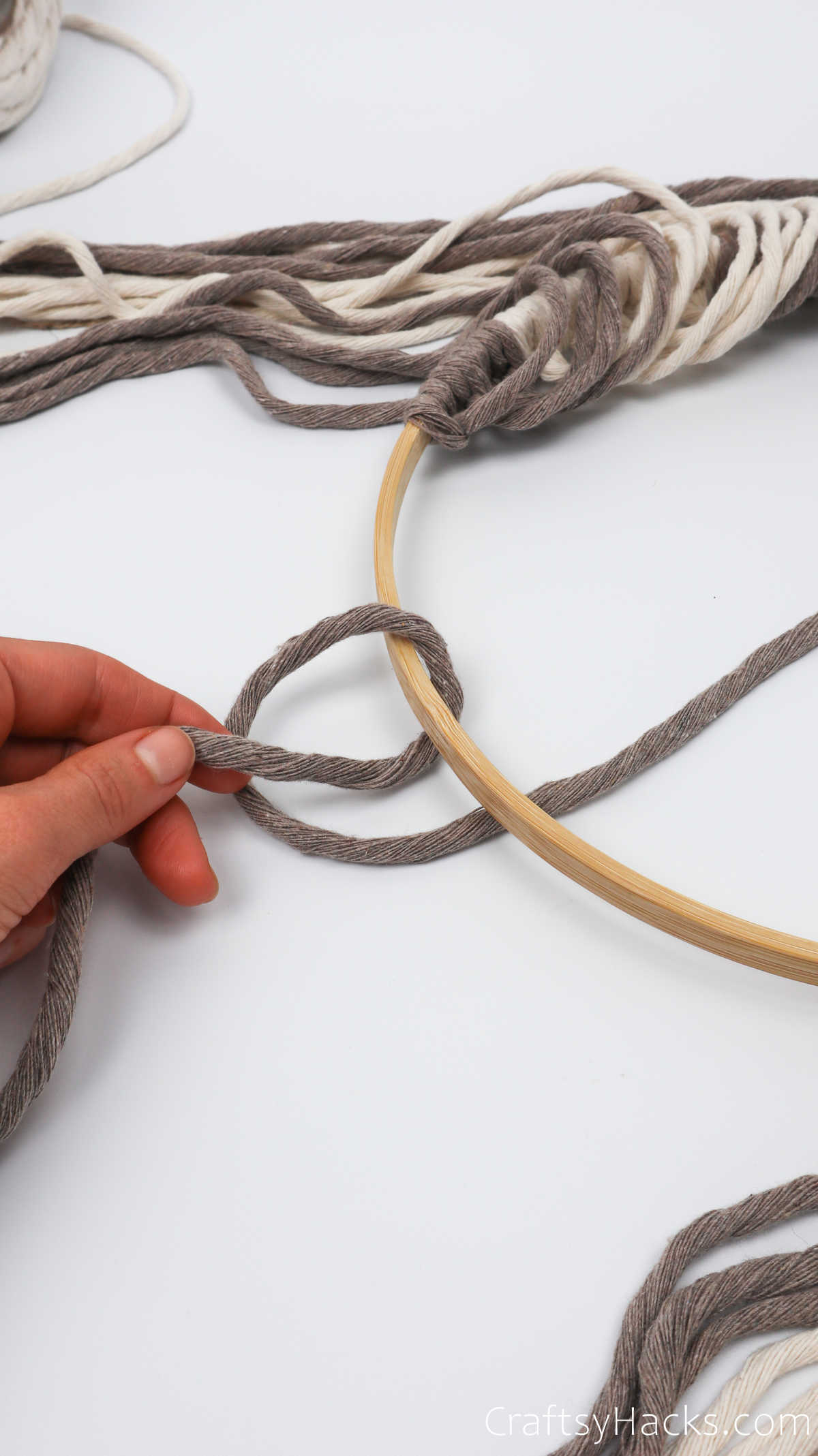 folding yarn around hoop