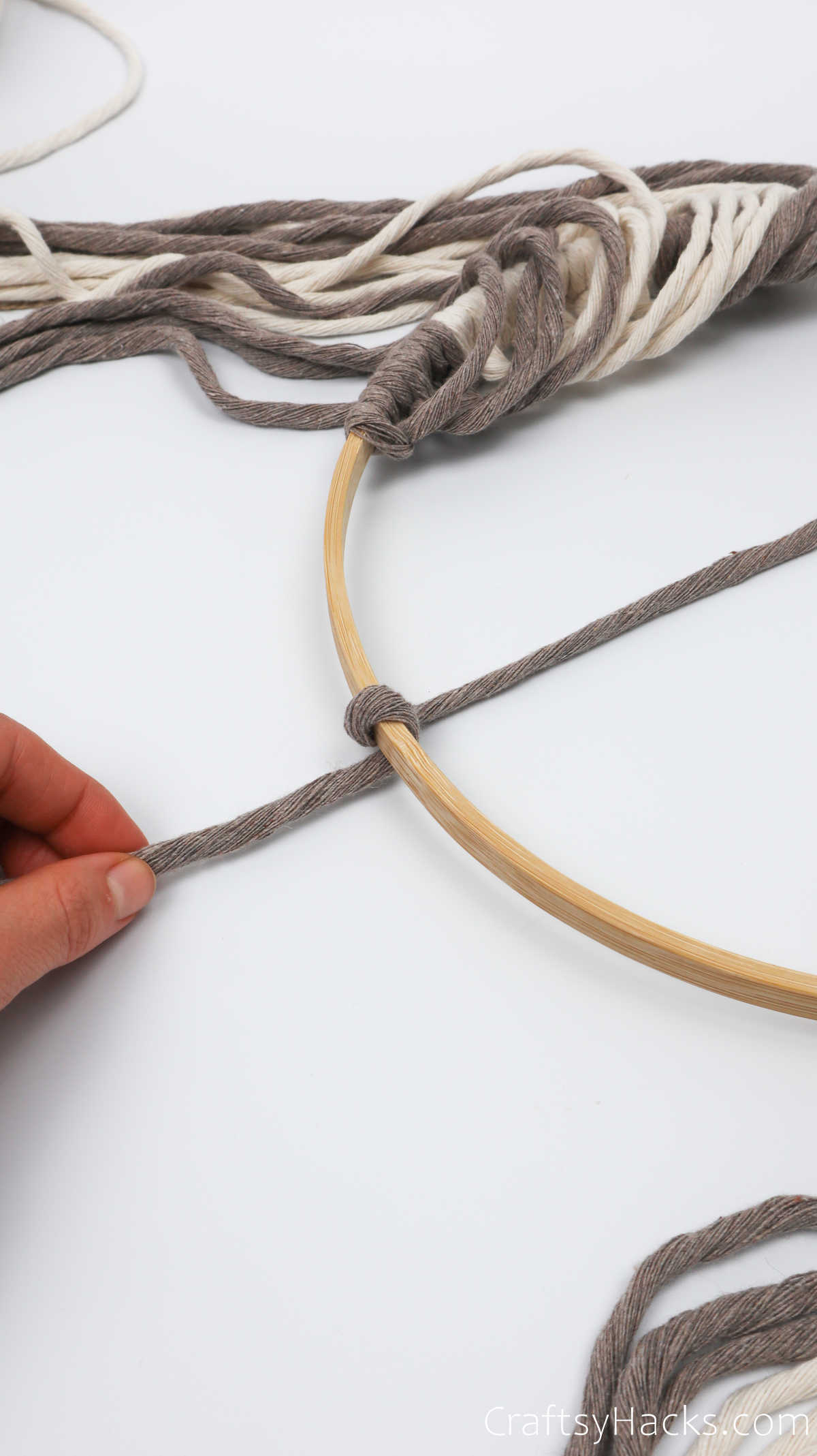 looping yarn around hoop