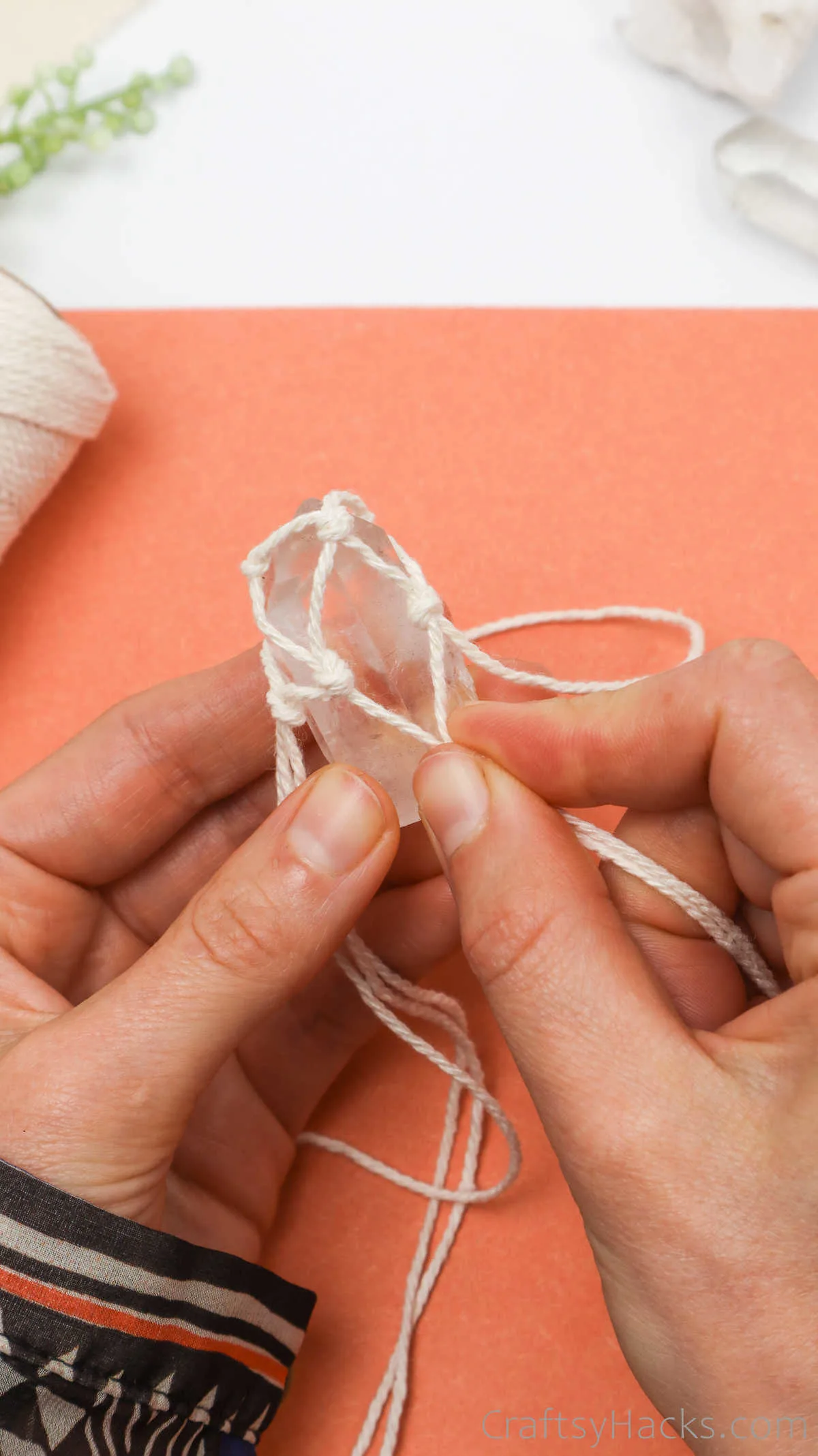 tying knots around crystal