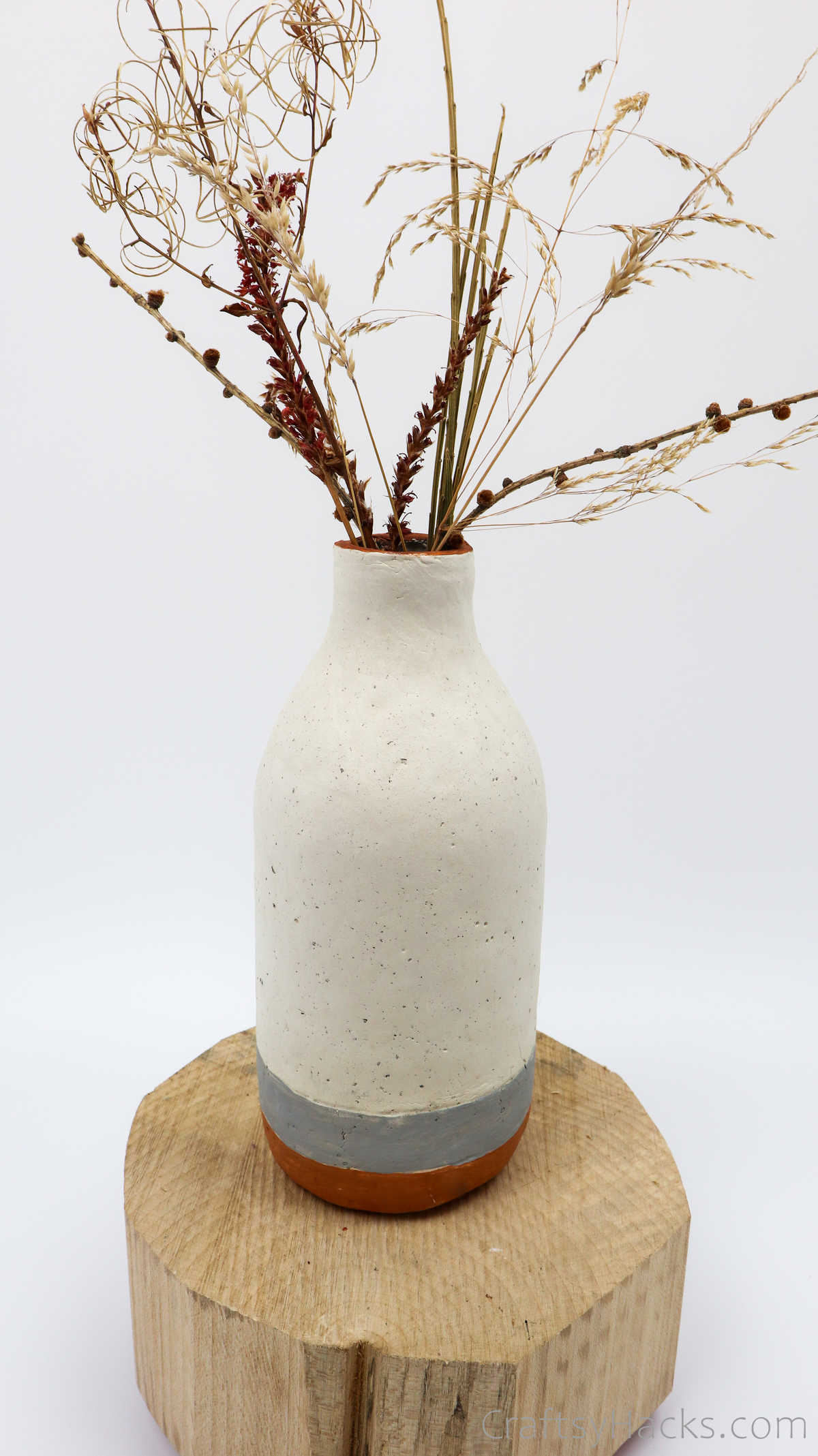 bottle vase with dried flowers