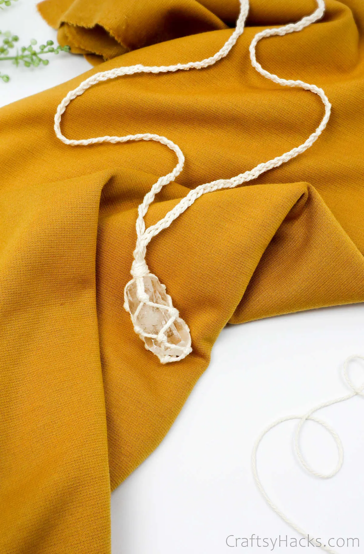 diy necklace on fabric