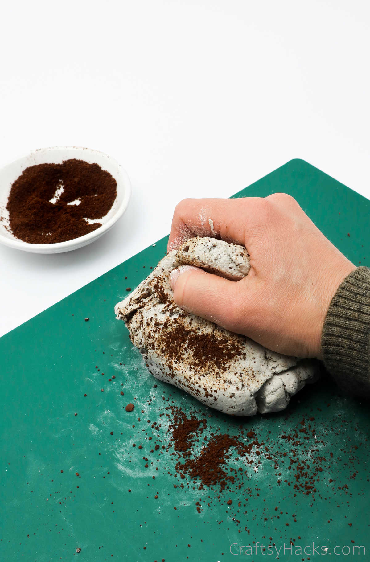 kneading coffee into clay