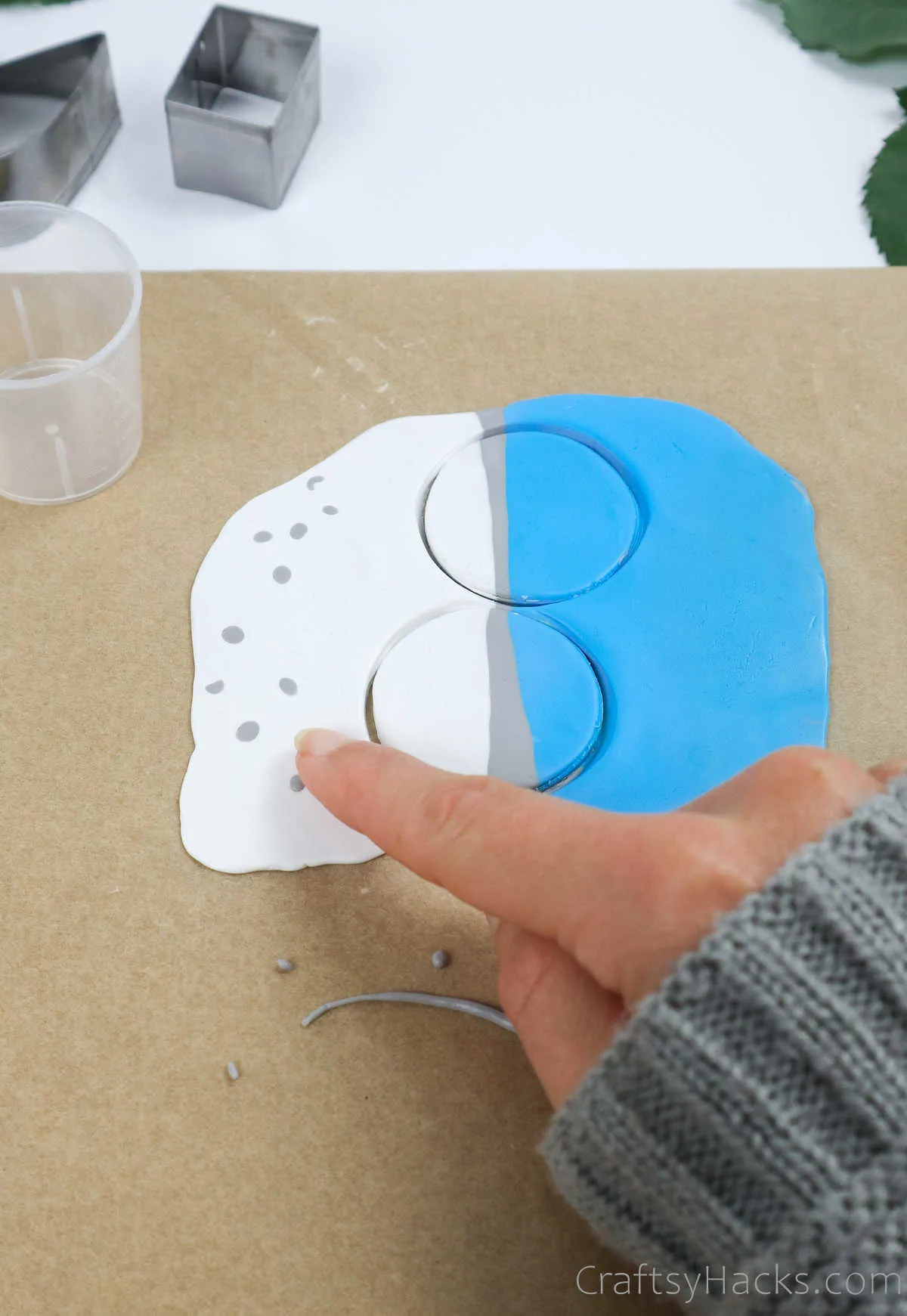 adding gray clay dots