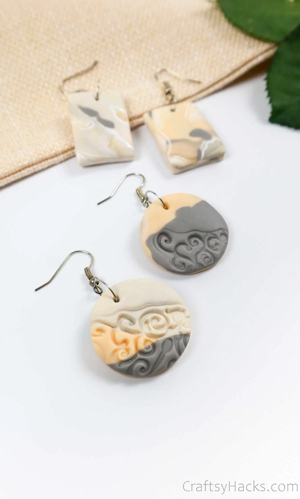 two pairs of clay earrings