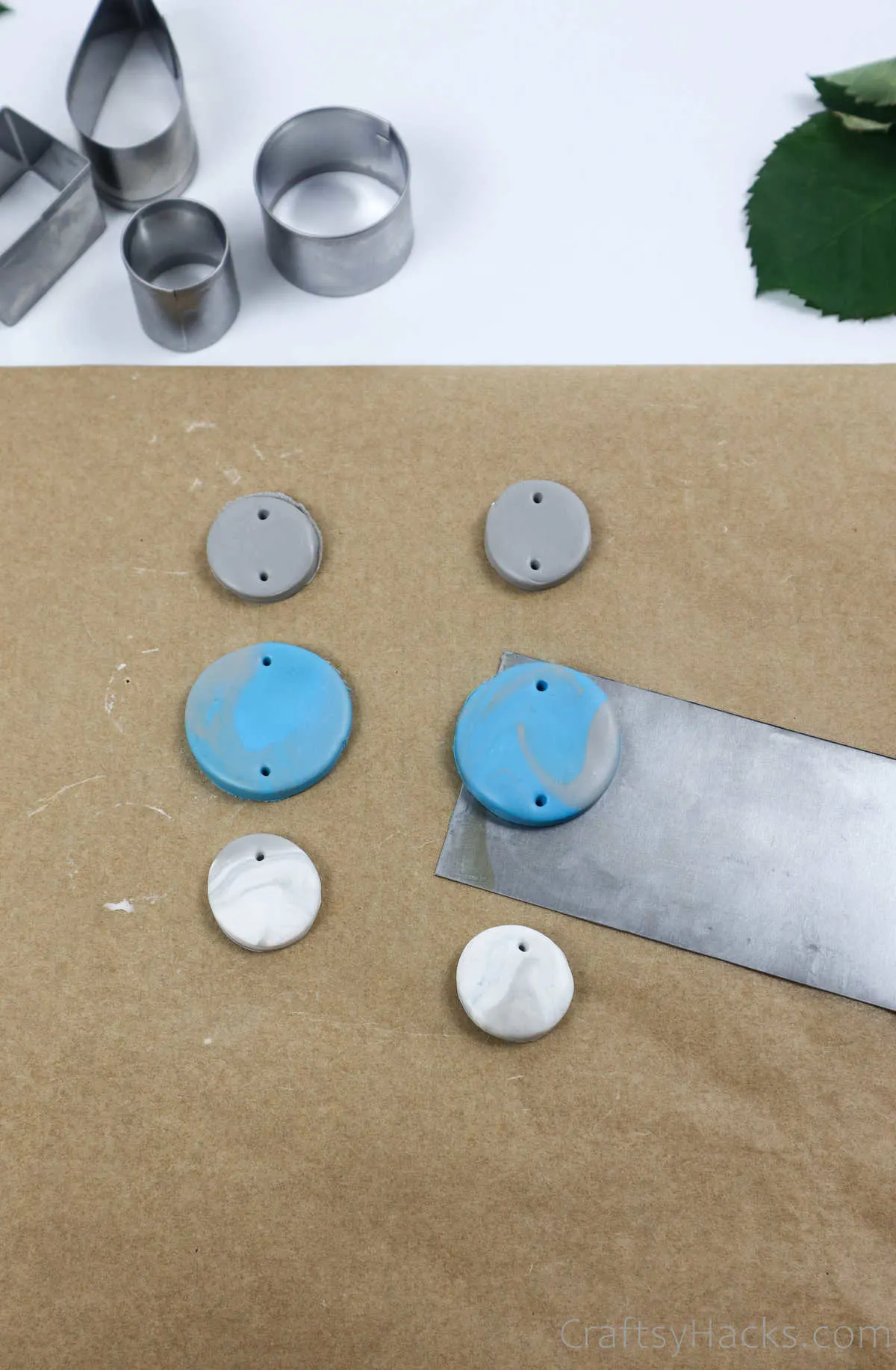 removing earrings from paper