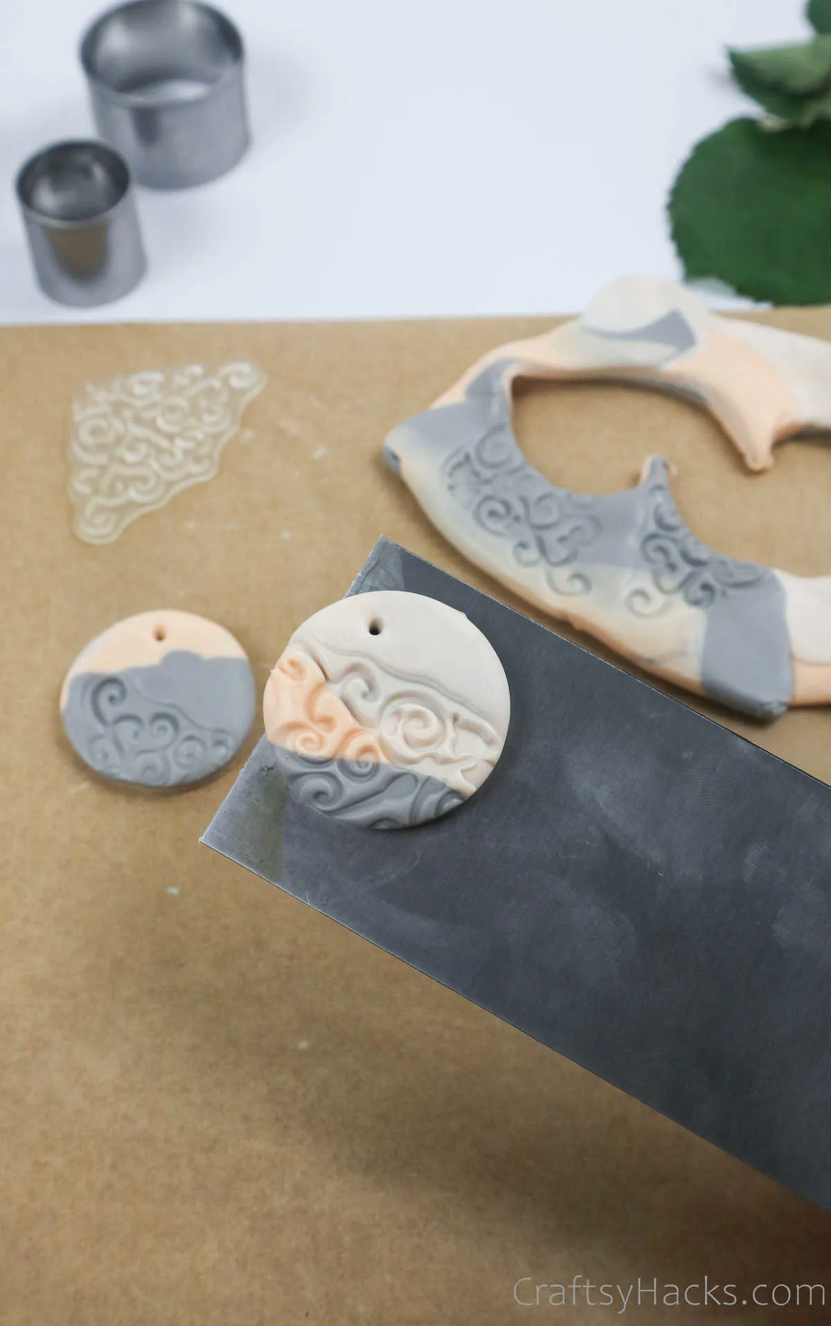 cutting out clay earring