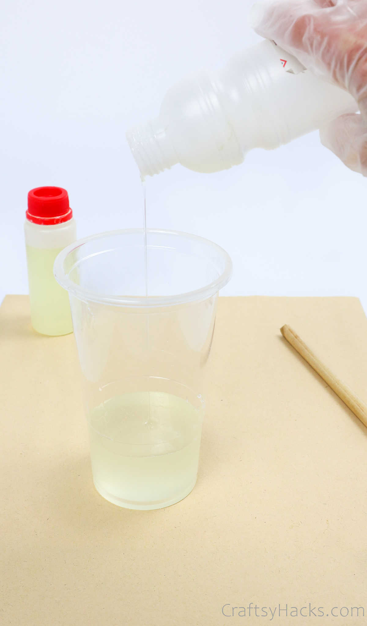 pouring resin in cup