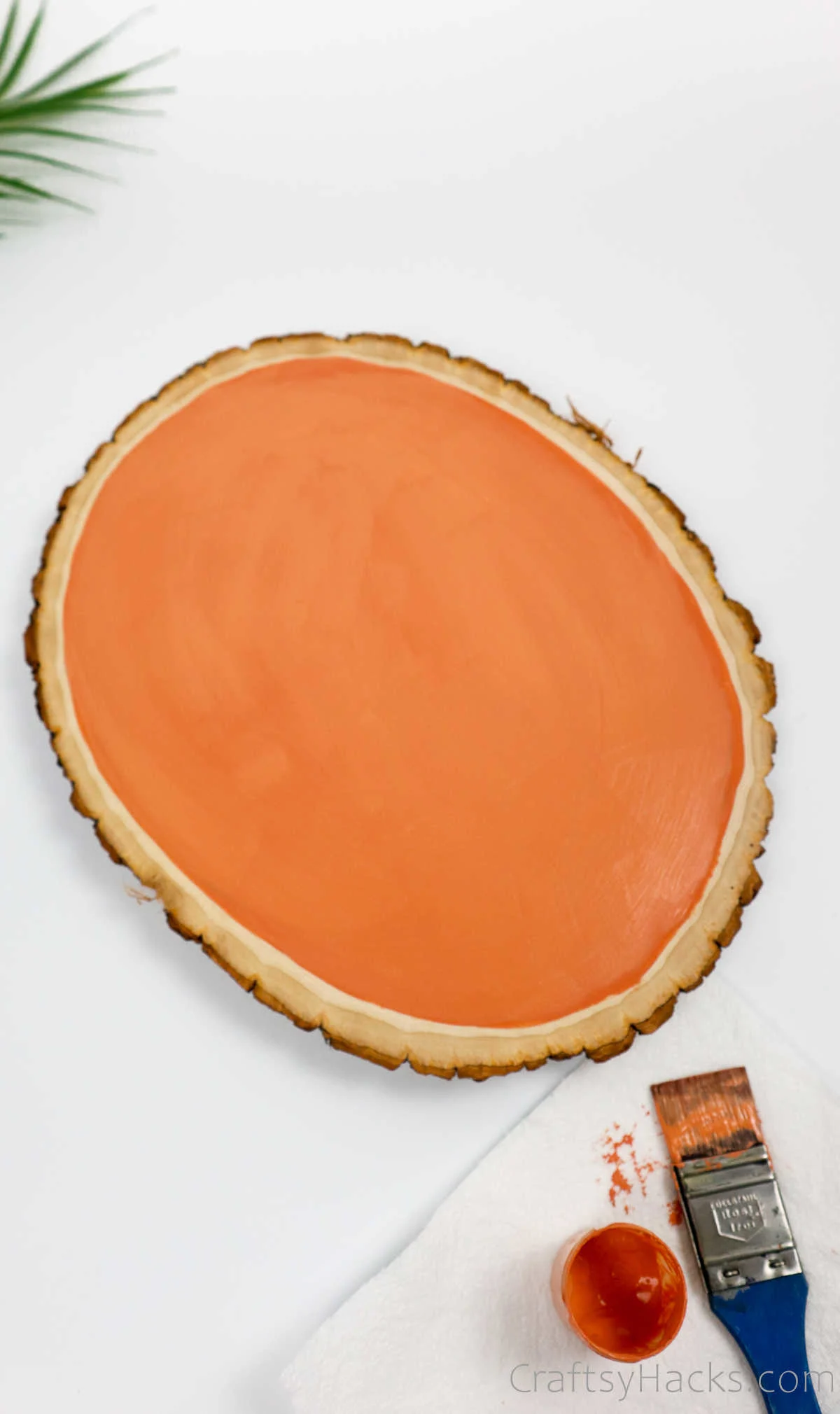 wood slice painted orange