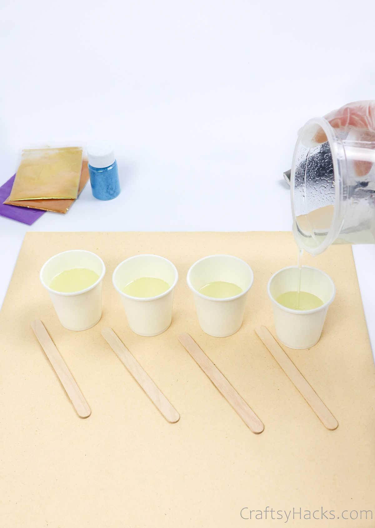 pouring resin in cups